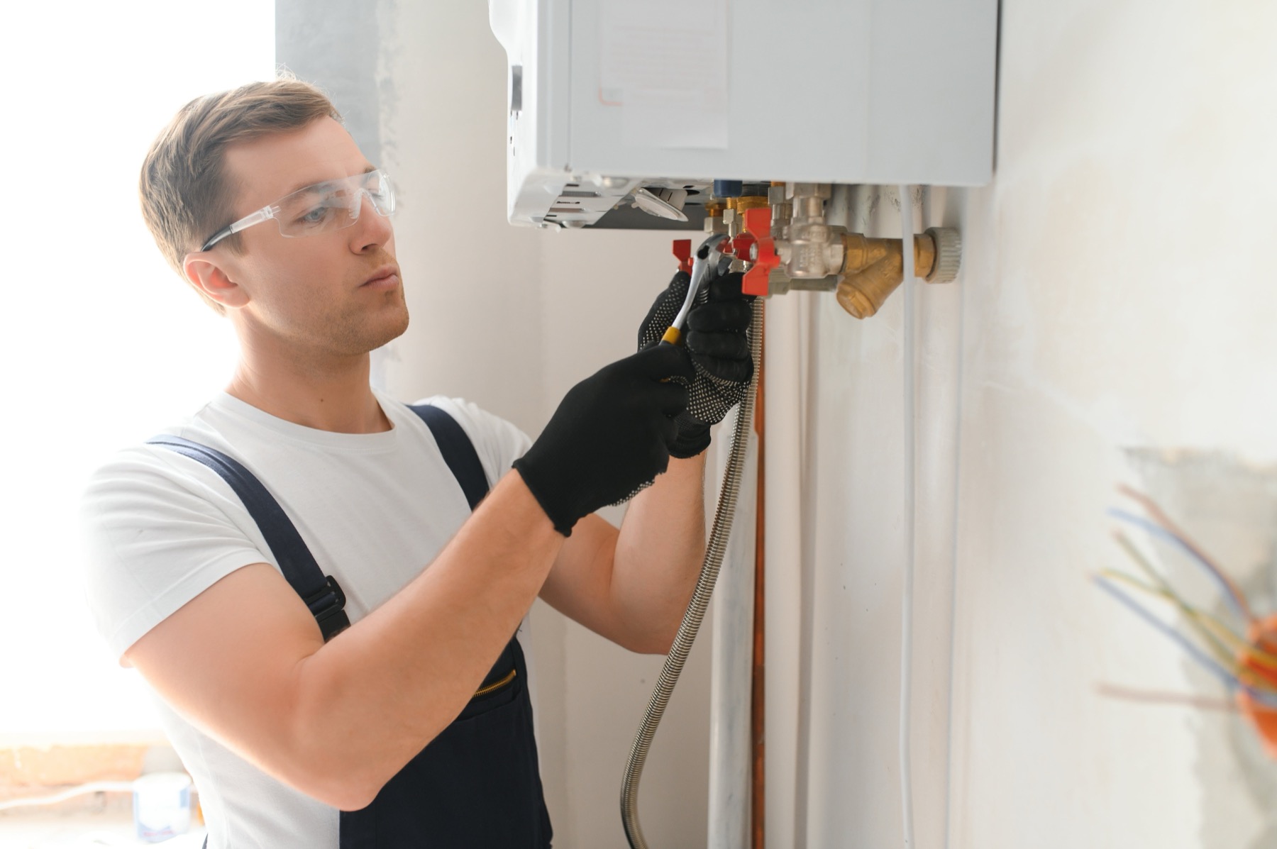 Gas engineer working on a boiler